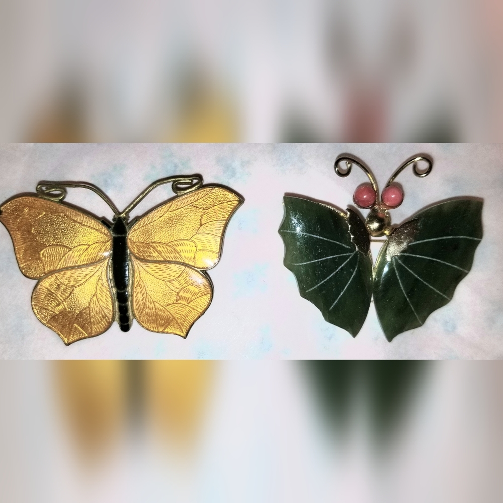 Yellow enamel butterfly brooch and jade butterfy brooch.